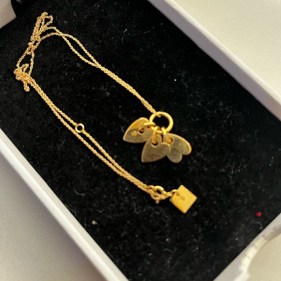 GINETTE NY
Angele 18K Rose Gold 3 Mini Heart Charms 17” Necklace - Picture 15 of 15